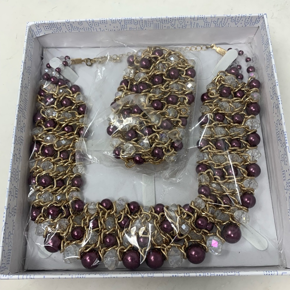 The skyline Collection gold tone purple beaded choker necklace and bracelet set